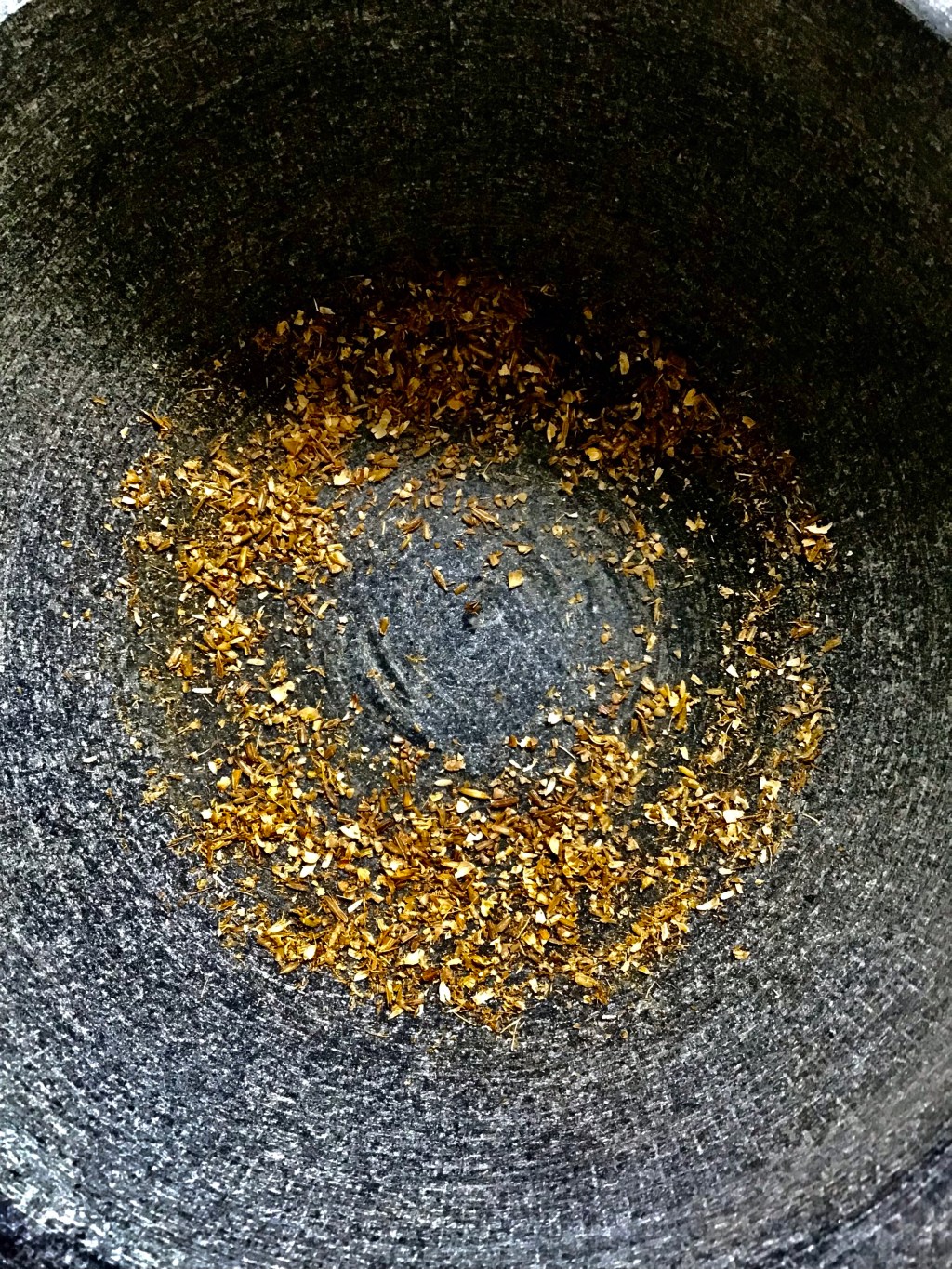 Coriander, fennel, and cumin in&nbsp;mortar