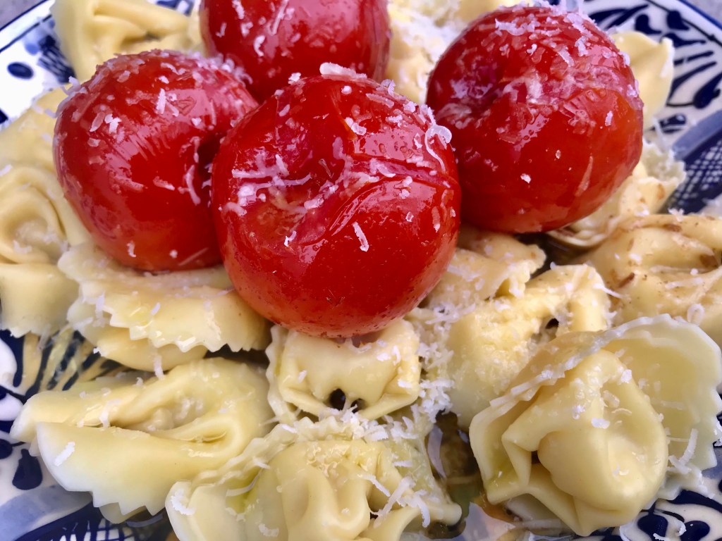 Tomatoes (with cumin and gin) on&nbsp;Tortellini