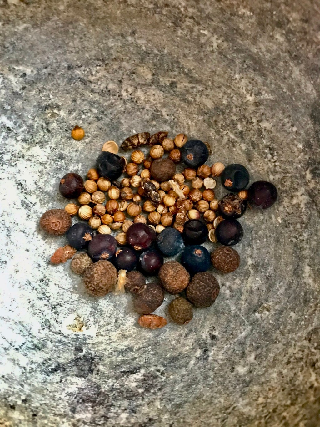 Coriander, juniper berries, allspice,&nbsp;cardamom