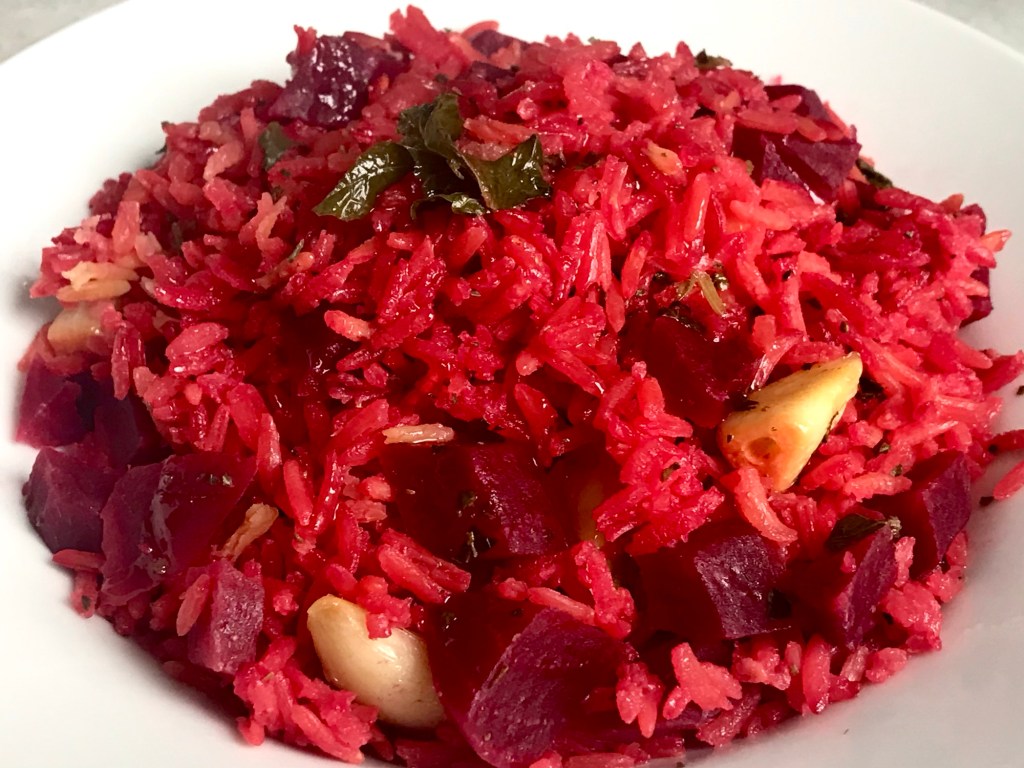 Rice with garlic, beetroot, and toronjil (lemon balm)